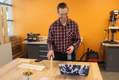 a maker in the makerspace