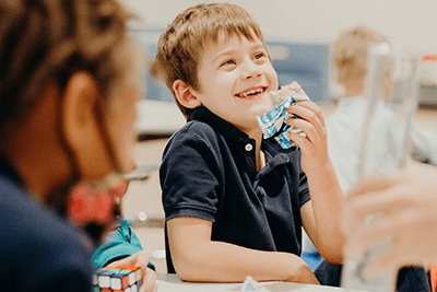 lower school student smiling in panther club