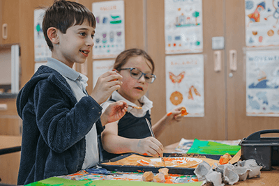 Lower School students working in art class together