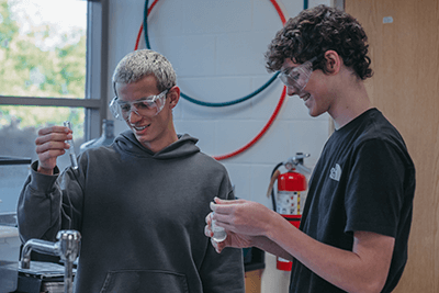 Upper School students working in chemistry together