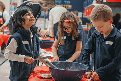 kindergarten students baking pies